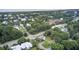 Aerial view of the community with lush trees, showcasing the property's location near the beach at 2530 Jasper Blvd, Sullivans Island, SC 29482