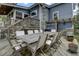 Back deck with dining table for ten, umbrella and outdoor grill; great for relaxing and entertaining at 2530 Jasper Blvd, Sullivans Island, SC 29482