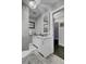Charming bathroom featuring white vanity with marble top, and neutral color palette at 2530 Jasper Blvd, Sullivans Island, SC 29482