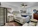 Bright bedroom with area rug, unique decor, and a light blue accent pillow at 2530 Jasper Blvd, Sullivans Island, SC 29482