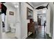 Hallway view with white walls and a decorative antique wooden chest at 2530 Jasper Blvd, Sullivans Island, SC 29482