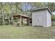 Outdoor storage shed with covered storage, providing practical space for tools and equipment at 2530 Jasper Blvd, Sullivans Island, SC 29482