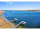 Stunning aerial view of waterfront property with private docks on a bright, sunny day at 2725 Starfish Dr, Johns Island, SC 29455