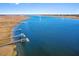 Gorgeous aerial view of waterfront property featuring private docks in a sunny environment at 2725 Starfish Dr, Johns Island, SC 29455