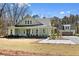 Beautiful home with a guest house, surrounded by lush landscaping and a well-maintained yard at 2725 Starfish Dr, Johns Island, SC 29455