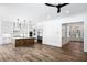 Open-concept layout with a kitchen island and stainless steel appliances is perfect for entertaining at 2725 Starfish Dr, Johns Island, SC 29455