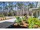 Beautiful landscaping and well-maintained yard adds to the curb appeal of this charming home at 2725 Starfish Dr, Johns Island, SC 29455