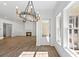 View of the living room and fireplace with hard wood floors at 2725 Starfish Dr, Johns Island, SC 29455