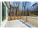 Relax on the concrete patio surrounded by lush landscaping and mature trees at 2725 Starfish Dr, Johns Island, SC 29455