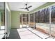 Relaxing screened-in porch with fan and outdoor views at 2725 Starfish Dr, Johns Island, SC 29455