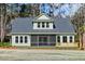 The home boasts a large screened porch and ample natural light at 2725 Starfish Dr, Johns Island, SC 29455