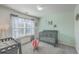 Bedroom featuring cribs, carpet, and natural light at 2755 Lacy St, North Charleston, SC 29406