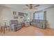 Cozy living room featuring comfortable seating, a ceiling fan, and inviting decor at 2755 Lacy St, North Charleston, SC 29406