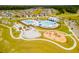 Scenic aerial view showcasing a new home community and splashpad and playground area at 284 Watersglen Dr, Summerville, SC 29486