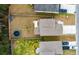 Aerial view of the backyard features a fence, patio, and trampoline at 341 Iveson Rd, Summerville, SC 29486
