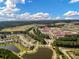 Wide aerial showcases a vibrant community with homes, schools, recreation and natural beauty at 341 Iveson Rd, Summerville, SC 29486