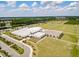 Aerial view of a modern recreational facility with sports fields, parking, and well-maintained landscaping at 341 Iveson Rd, Summerville, SC 29486