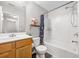Bright bathroom features a shower and tub combination and a single sink vanity at 341 Iveson Rd, Summerville, SC 29486