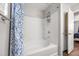Bathroom features a white tub-shower combination with blue patterned curtain at 341 Iveson Rd, Summerville, SC 29486