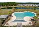 Beautiful community pool with tables, chairs, lounge seating, and a lovely outdoor shower at 341 Iveson Rd, Summerville, SC 29486