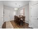 A cozy dining area featuring a wooden table and chairs beneath a pendant light at 341 Iveson Rd, Summerville, SC 29486