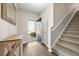 Stylish foyer with wood flooring, staircase, and ample natural light at 341 Iveson Rd, Summerville, SC 29486