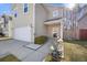 Charming two-story home with a well-maintained lawn and a two-car garage at 341 Iveson Rd, Summerville, SC 29486
