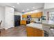 Well-lit kitchen with modern appliances, wood cabinets and a neutral countertop at 341 Iveson Rd, Summerville, SC 29486