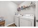 This laundry room features a side-by-side washer and dryer at 341 Iveson Rd, Summerville, SC 29486