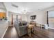 Bright living room with hardwood floors, a comfortable couch, and an open floor plan at 341 Iveson Rd, Summerville, SC 29486
