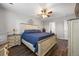 Spacious bedroom featuring wood floors, a large bed, and ample storage at 341 Iveson Rd, Summerville, SC 29486