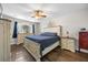 Bedroom with wood floors, a large bed, and matching dressers at 341 Iveson Rd, Summerville, SC 29486