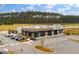 Commercial building featuring several restaurants and dental offices with spacious parking and modern design at 341 Iveson Rd, Summerville, SC 29486