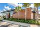 Modern commercial building featuring contemporary design, large windows, and mature palm tree landscaping at 341 Iveson Rd, Summerville, SC 29486