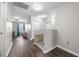 Spacious upstairs hallway with wood floors and plenty of natural light at 341 Iveson Rd, Summerville, SC 29486