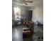 Living room with wood floors, storage shelves, boxes and bright window at 342 Early Ln, Summerville, SC 29486