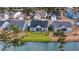 Aerial view of the home showcasing its location within a neighborhood with landscaping and water views at 357 Tupelo Lake Dr, Summerville, SC 29486