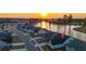 Aerial view of the home showcasing its location within a neighborhood with landscaping and water views at sunset at 357 Tupelo Lake Dr, Summerville, SC 29486