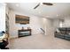 Cozy bonus room with a comfortable sofa, stylish furniture, and a ceiling fan for added comfort at 357 Tupelo Lake Dr, Summerville, SC 29486