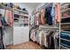 Spacious walk-in closet with custom shelving, ample storage, and hardwood floors at 357 Tupelo Lake Dr, Summerville, SC 29486