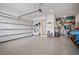 Spacious garage with an epoxy floor and ample storage space, providing convenience and organization at 357 Tupelo Lake Dr, Summerville, SC 29486
