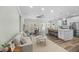 Open-concept living space featuring modern kitchen, stylish furniture, and bright natural light at 39 Briarcliff Dr, Charleston, SC 29407