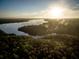 Stunning aerial view of vast, green wetlands under a hazy, bright sky at 3902 Summerton St, Mount Pleasant, SC 29466