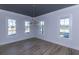 Dining room with hardwood floors, a statement light fixture and abundant natural light at 3902 Summerton St, Mount Pleasant, SC 29466