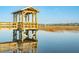 Waterfront home offers private dock with covered seating area and water access at 3902 Summerton St, Mount Pleasant, SC 29466