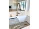 Modern kitchen island featuring a sink and metal drying rack, complete with stainless steel fixtures at 3902 Summerton St, Mount Pleasant, SC 29466