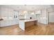 Modern kitchen featuring a large island, stainless steel appliances, and custom cabinetry at 3902 Summerton St, Mount Pleasant, SC 29466