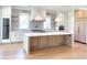 Spacious kitchen features a large island, stainless appliances, wine fridge and custom cabinetry at 3902 Summerton St, Mount Pleasant, SC 29466