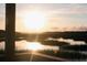 Scenic view of the sun setting over the marsh from a private dock at 3902 Summerton St, Mount Pleasant, SC 29466