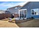 Private backyard offers a patio, a grill, and views of the well-maintained lawn and neighboring homes at 400 Hampstead Ct, Summerville, SC 29486